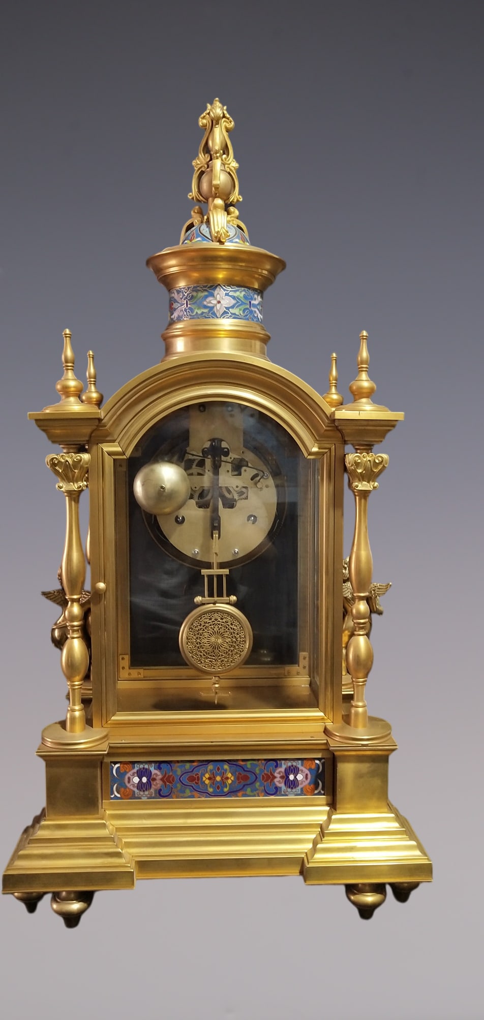 An Exquisite Gilt Bronze Lotus Pattern Clock: An Exquisite Gilt Bronze Lotus Pattern Clock Size:28.7inx14.2inx10.6in铜鎏金缠枝莲纹钟表 Size:73cmx36cmx27cm