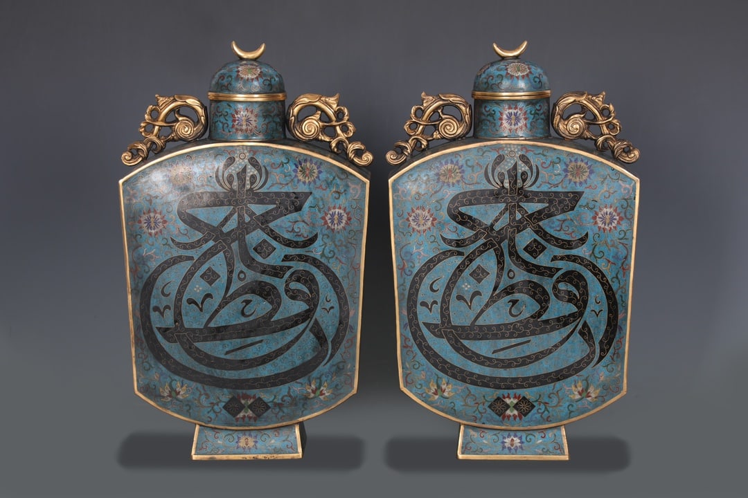 A Pair of Exquisite Cloisonne Lotus Pattern Double-Ears Vase: A Pair of Exquisite Cloisonne Lotus Pattern Double-Ears Vase Qing Dynasty, China Size:17.7inx10.2in