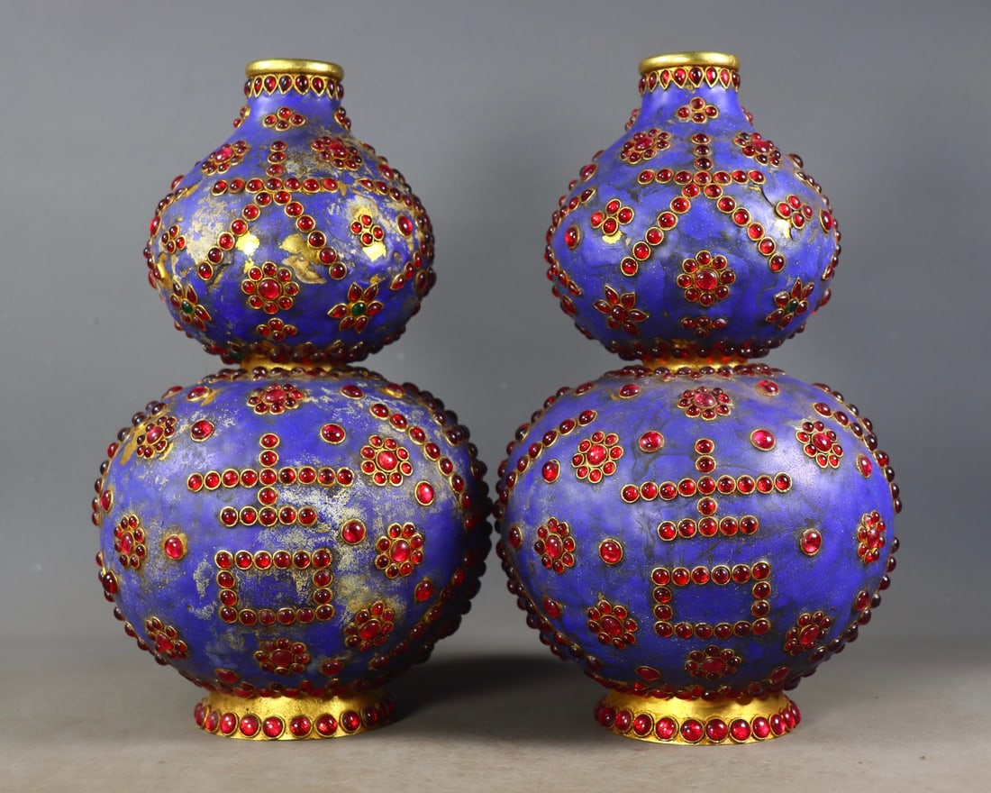 An Exquisite Gilt Bronze Inlaid Gems Gourd-Shaped Vase: An Exquisite Gilt Bronze Inlaid Gems Gourd-Shaped Vase Qing Dynasty, China Qianlong Four-character Mark Size:9.8inx5.1in