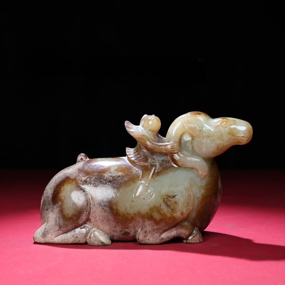 An Exquisite White Jade Sheep Ornament: An Exquisite White Jade Sheep Ornament Han Dynasty, China Size:7.3inx4.1inx2.6in Weight:1524g白玉羊摆件 中国汉代 Size:18.6cmx10.5cmx6.6cm