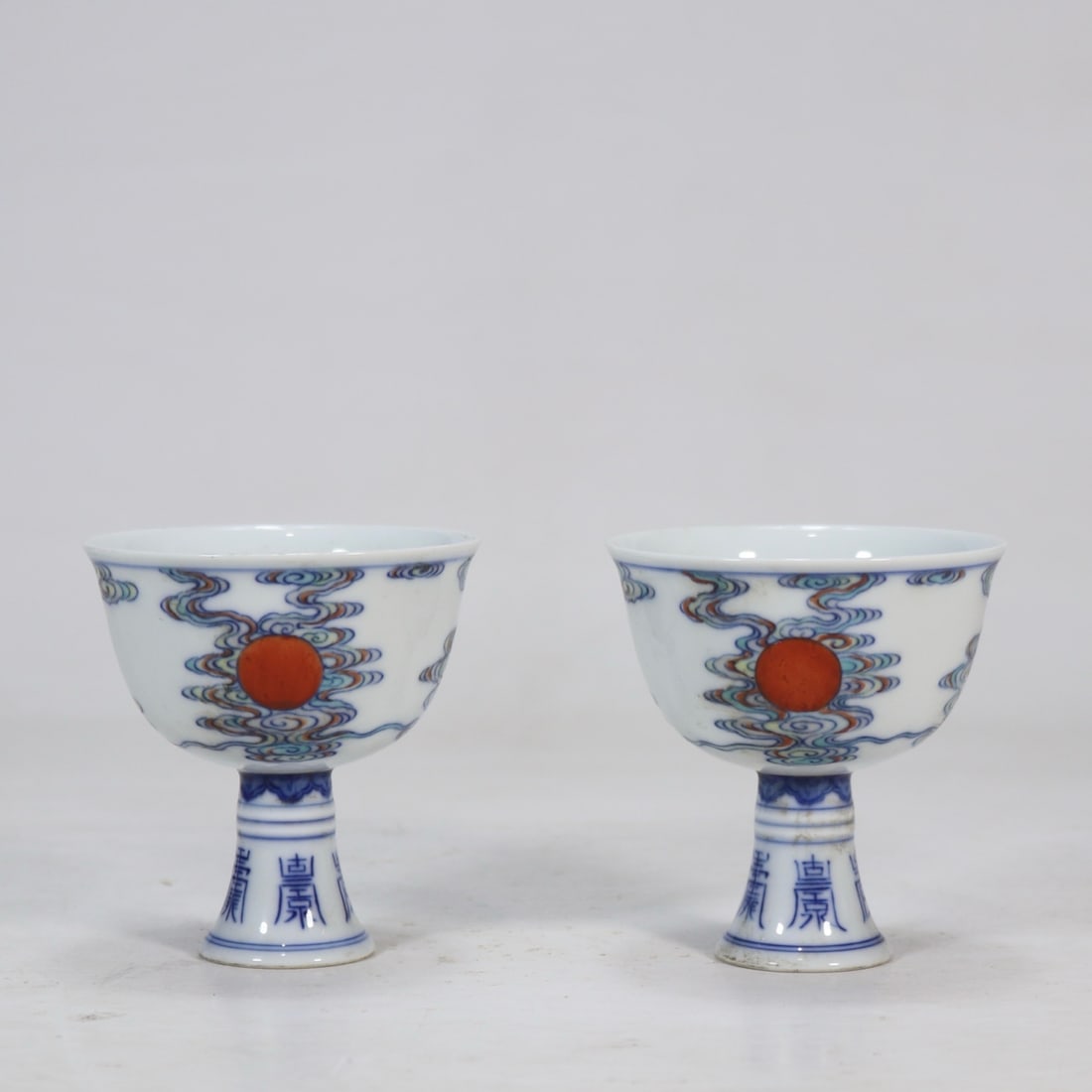 A Pair of Exquisite Doucai Auspicious Cloud Pattern Cup: A Pair of Exquisite Doucai Auspicious Cloud Pattern Cup Qing Dynasty, China Yongzheng Six-character Mark