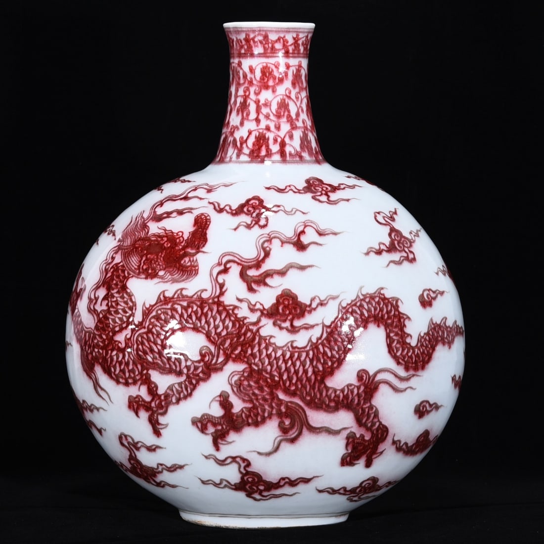 An Exquisite Underglaze-Red Dragon Pattern Vase: An Exquisite Underglaze-Red Dragon Pattern Vase Ming Dynasty, China Size:17.3inx13.6in釉里红龙纹扁瓶 中国明代 Size:44cmx34.5cm