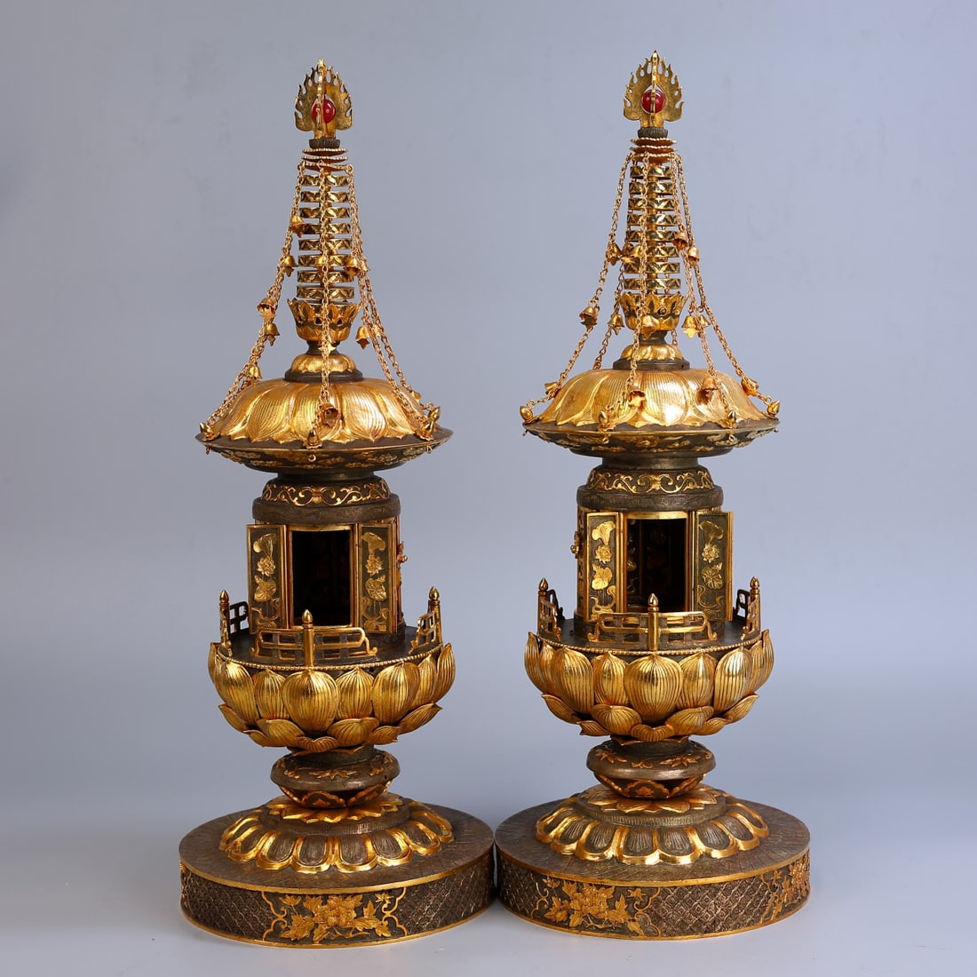 A Pair of Exquisite Gilt Bronze Pagoda: A Pair of Exquisite Gilt Bronze Pagoda Tang Dynasty, China Size:19.7inx7.1in Weight:7165g铜鎏金佛塔一对 中国唐代 Size:50cmx18cm
