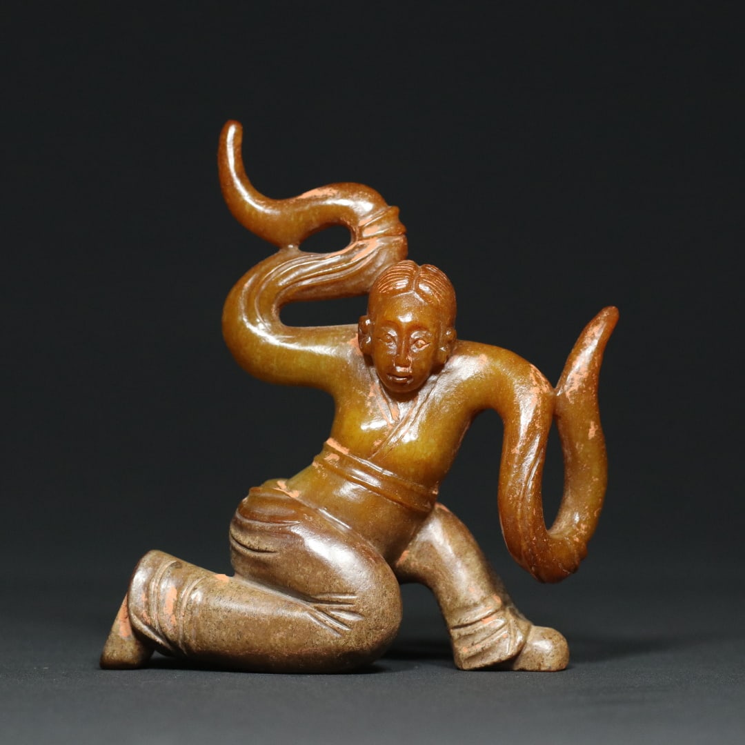 An Exquisite White Jade Figure Ornament: An Exquisite White Jade Figure Ornament Han Dynasty, China Size:4.3inx4.3inx1.5in Weight:238.2g白玉舞人摆件 中国汉代 Size:11cmx11cmx3.9cm