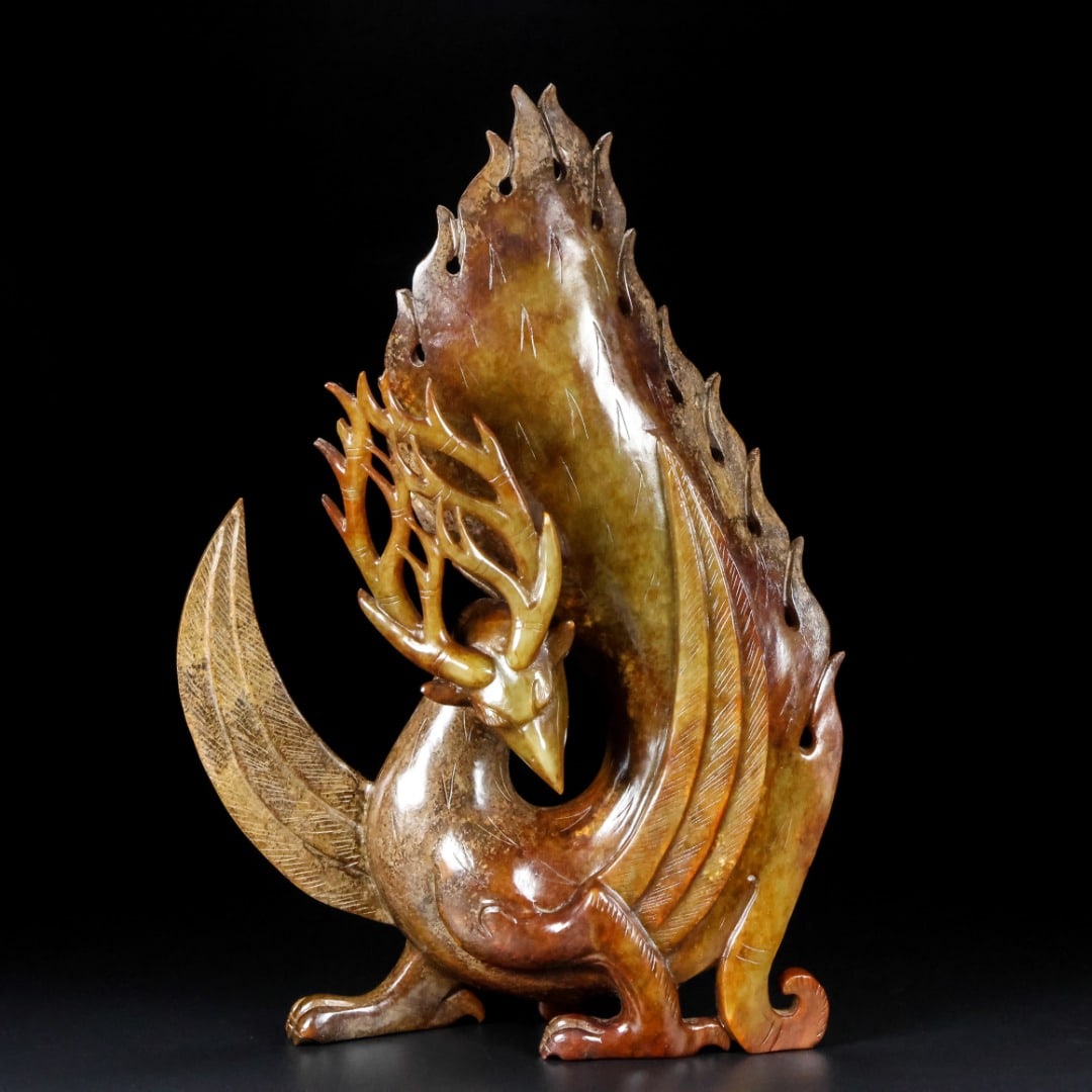 An Exquisite White Jade Phoenix Ornament: An Exquisite White Jade Phoenix Ornament Han Dynasty, China Size:11.7inx8.5inx2.1in Weight:2.09kg白玉凤鸟 中国汉代 Size:29.8cmx21.6cmx5.3cm