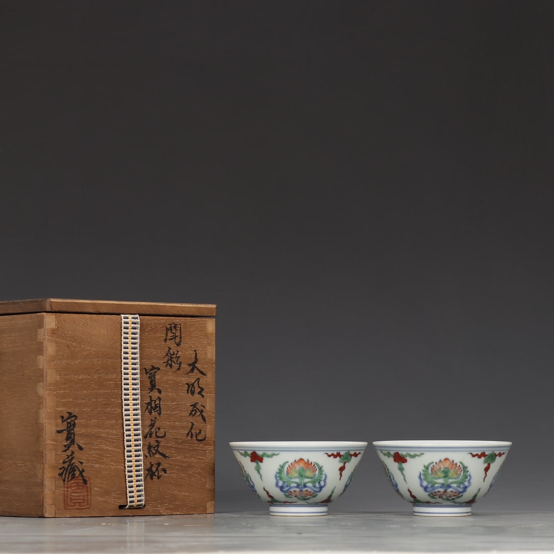 A Pair of Exquisite Doucai Flower Pattern Cup: A Pair of Exquisite Doucai Flower Pattern Cup Ming Dynasty, China Chenghua Six-character Mark Size:1.8inx3.5in斗彩宝相花纹杯一对 中国&