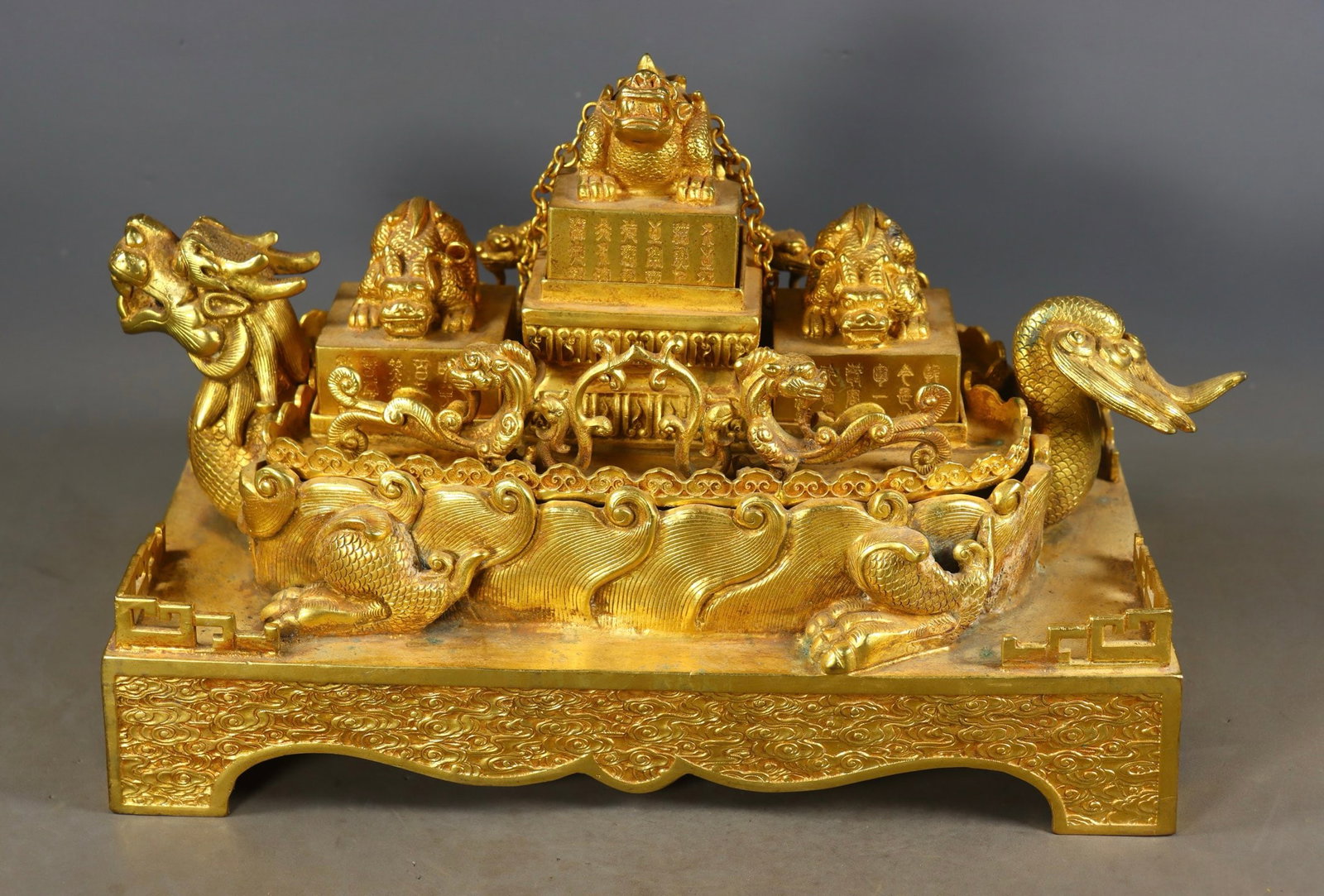 A Set of Fine Gilt Bronze Auspicious Beast Seal: A Set of Fine Gilt Bronze Auspicious Beast Seal Qing Dynasty, China Size:8.7inx14.2inx7.9in Size:3inx2.4in2in Size:8.7inx1.6in