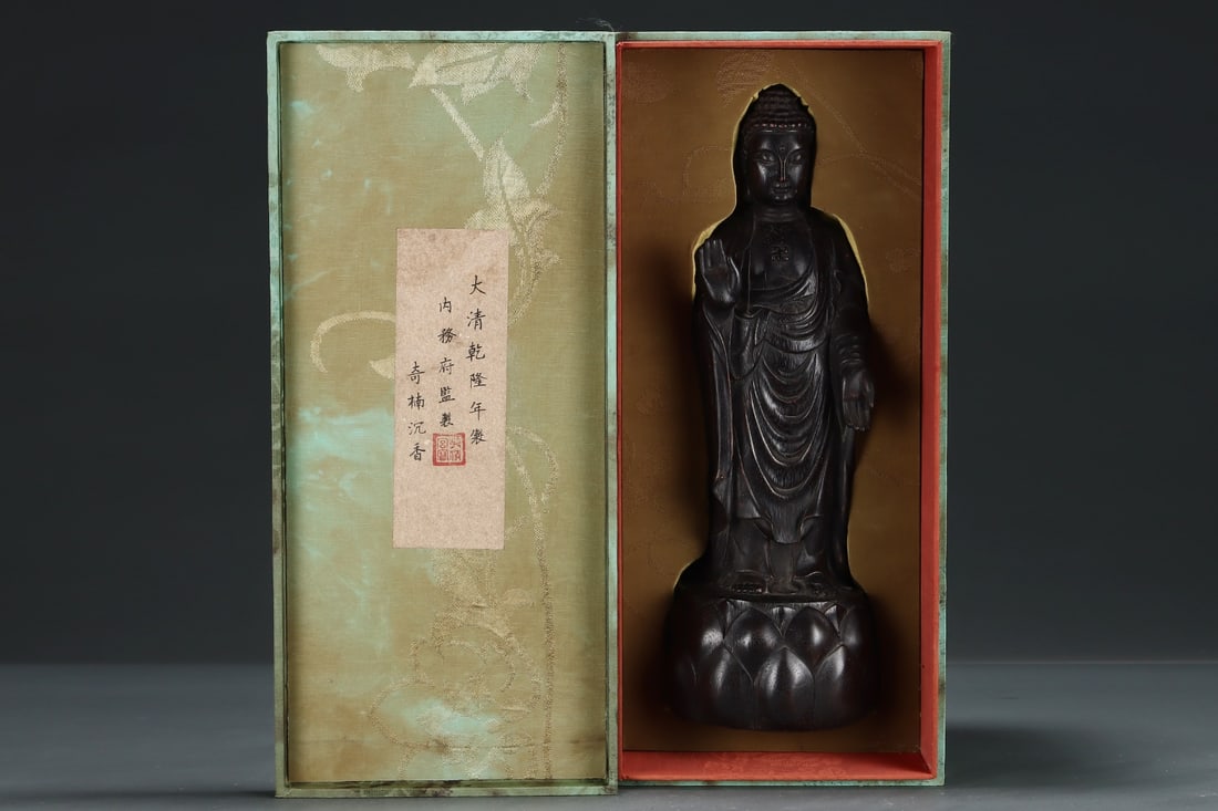 An Exquisite Eaglewood Statue of Sakyamuni: An Exquisite Eaglewood Statue of Sakyamuni Qing Dynasty, China Size:5.5inx15.9in沉香大日如来佛祖 中国清代 Size:14cmx40.5cm
