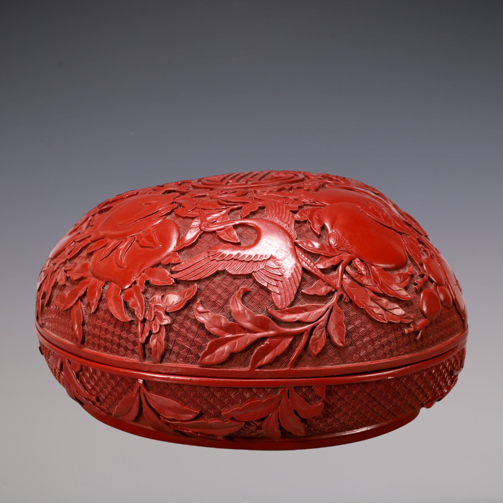 A Exquisite Carved Red Lacquer Bats and Peach Pattern Crane Pattern Peach-shaped Box: A Exquisite Carved Red Lacquer Bats and Peach Pattern Crane Pattern Peach-shaped Box Qing Dynasty, China Qianlong Six-character Mark Size:16.1inx16.1inx7.9in