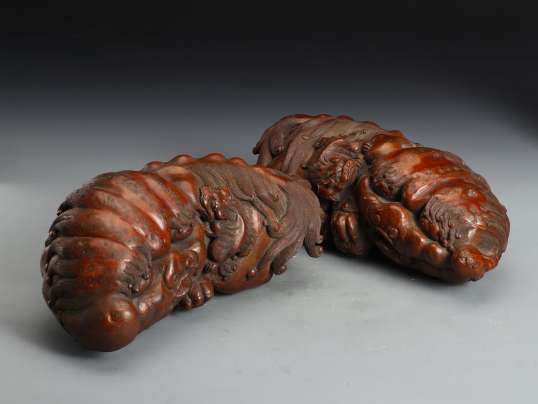 A Pair of Exquisite Bamboo Lion Ornament: A Pair of Exquisite Bamboo Lion Ornament Qing Dynasty, China Size:11.4inx5inx5in Weight:2620g竹根雕狮子摆件一对 中国清代