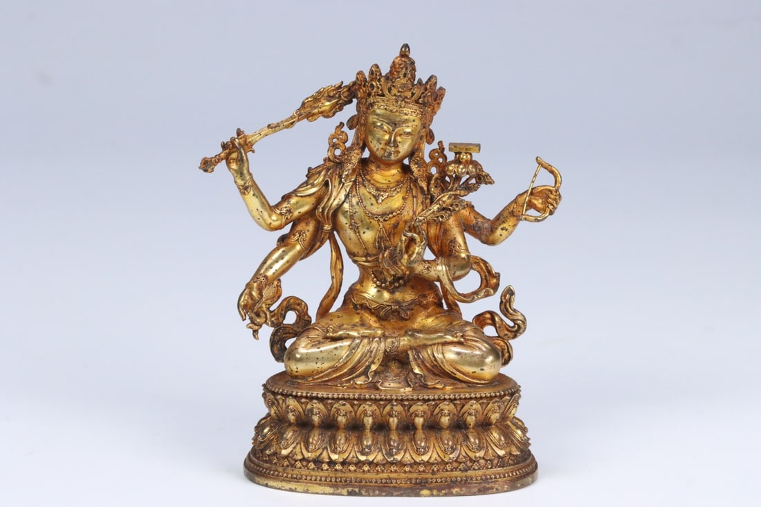 An Exquisite Gilt Bronze Statue of Gautama??s Mother: An Exquisite Gilt Bronze Statue of Gautama??s Mother Qing Dynasty, China Size:3.9inx2inx2.8in Weight:498g铜鎏金坐明佛母 中国清代