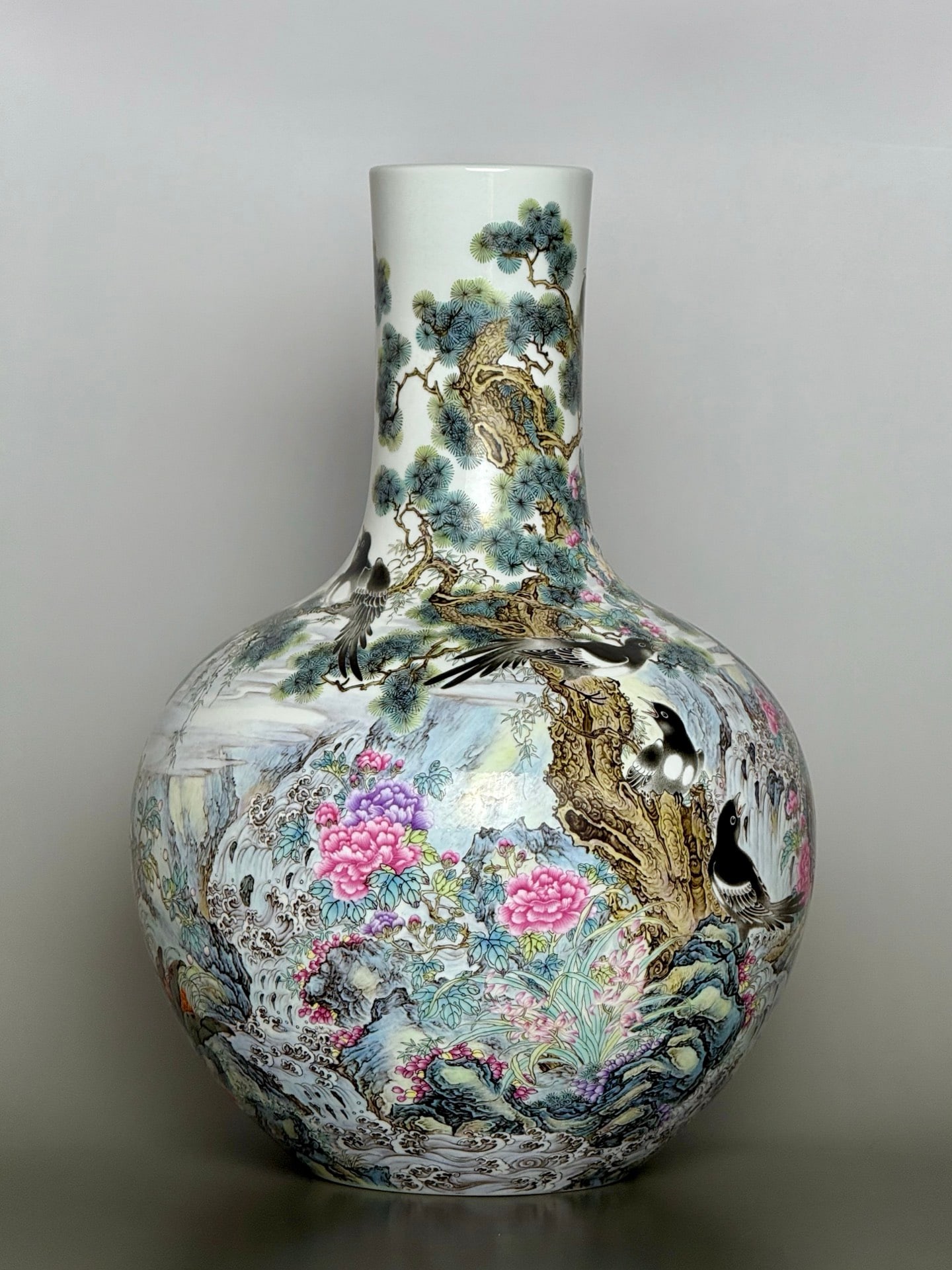 An Exquisite Famille-Rose Flower and Bird Pattern Vase: An Exquisite Famille-Rose Flower and Bird Pattern Vase Qing Dynasty, China Yongzheng Six-character Mark Size:15inx10.4in粉彩喜鹊花鸟山水寿喜
