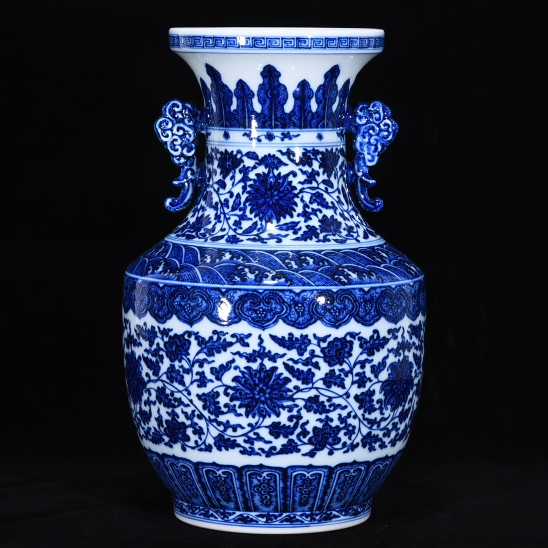 An Exquisite Blue and White Lotus Pattern Seawater Pattern Double-Ears Vase: An Exquisite Blue and White Lotus Pattern Seawater Pattern Double-Ears Vase Qing Dynasty, China Qianlong Six-character Mark