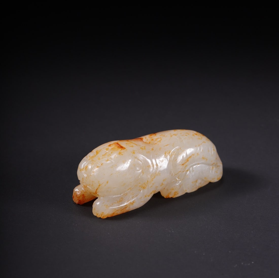 An Exquisite White Jade Auspicious Beast: An Exquisite White Jade Auspicious Beast Qing Dynasty, China Size:1.5inx0.6inx0.6in Weight:14.2g白玉瑞兽 中国清代 Size:3.8cmx1.5cmx1.4cm Weight:14.2g