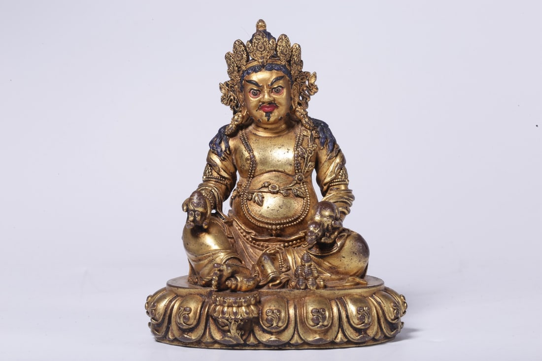 An Exquisite Gilt Bronze Statue of Mammon: An Exquisite Gilt Bronze Statue of Mammon Qing Dynasty, China Size:3.9inx3.3inx2.8in Weight:311g铜鎏金黄财神坐像 中国清代