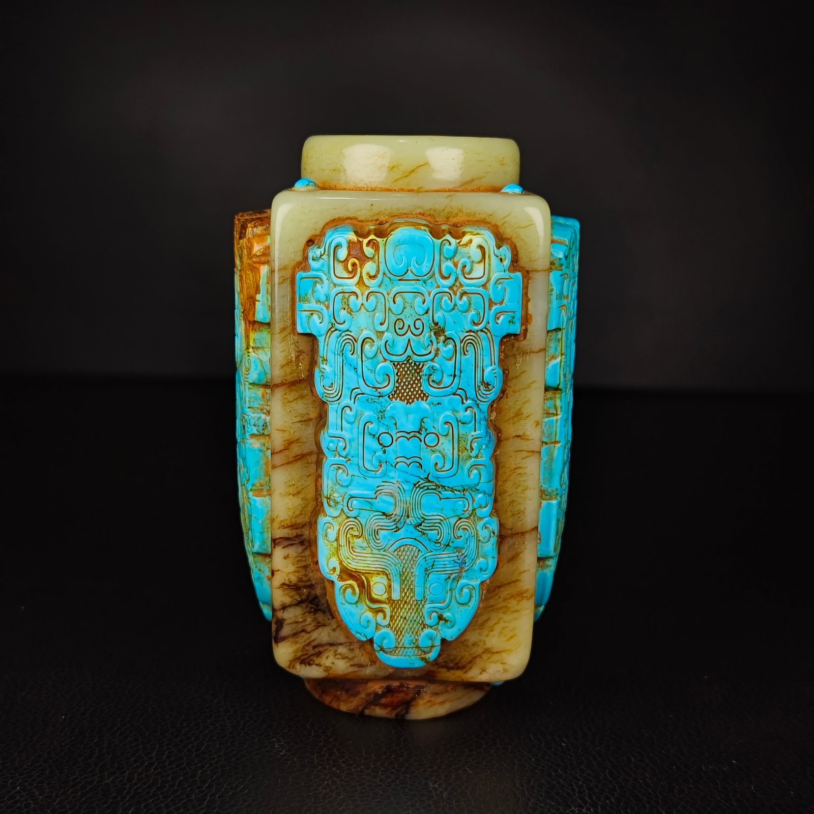 An Exquisite White Jade Inlaid Turquoise Beast-Face Pattern Ornament: An Exquisite White Jade Inlaid Turquoise Beast-Face Pattern Ornament N.Zhou , China Size:2.8inx5.1in Weight:937g嵌绿松石玉琮 商周时期