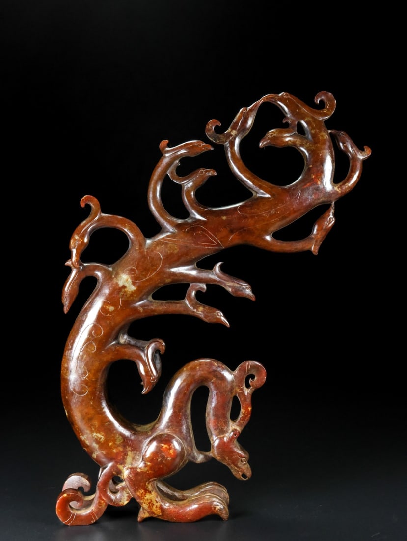An Exquisite White Jade Phoenix Ornament: An Exquisite White Jade Phoenix Ornament Han Dynasty, China Size:9.9inx8inx1.9in Weight:831g白玉凤鸟 中国汉代 Size:25.2cmx20.2cmx4.8cm Weight:831g
