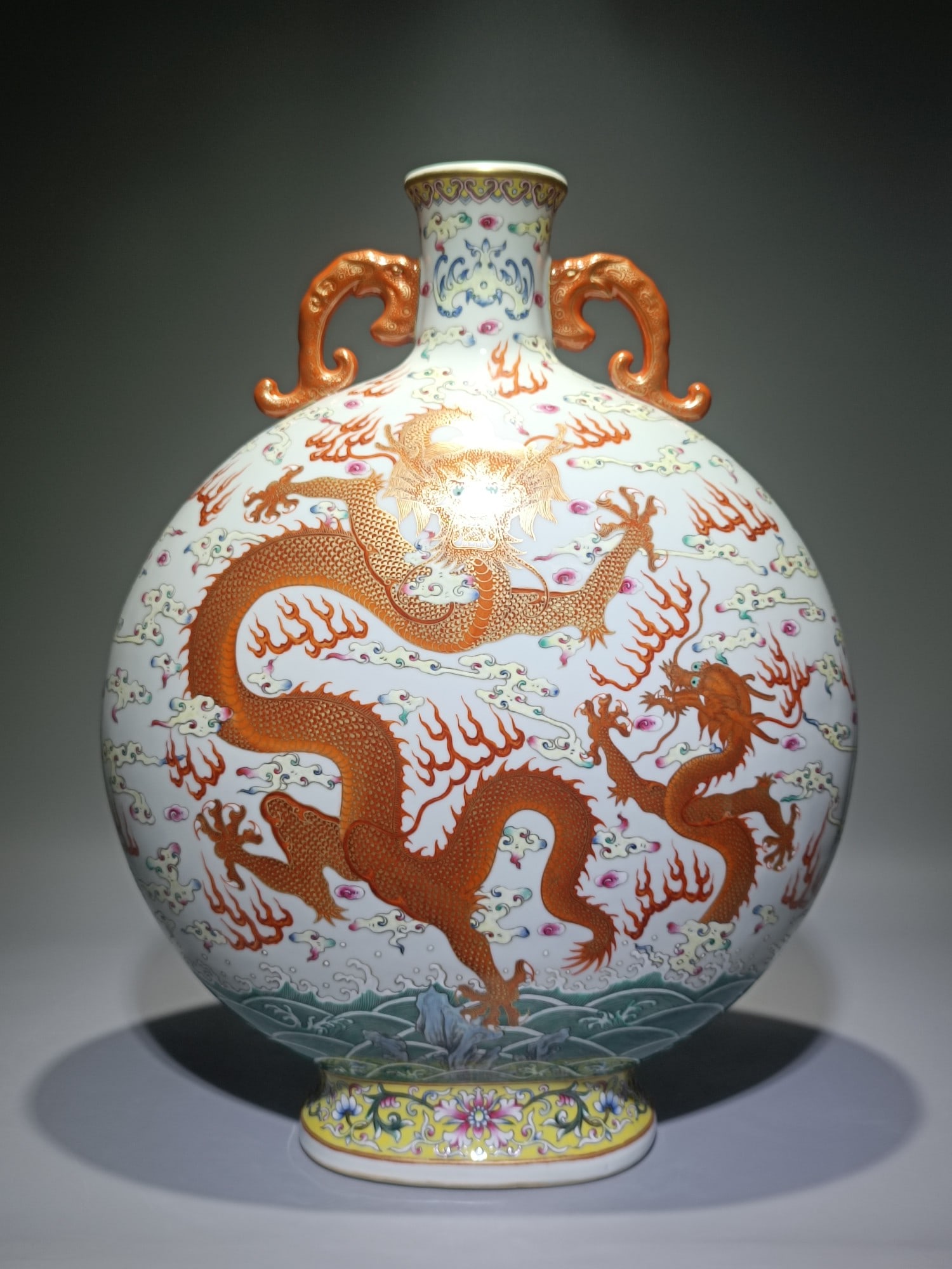 An Exquisite Famille-Rose Dragon Pattern Seawater Pattern Lotus Pattern Double-Ears Vase: An Exquisite Famille-Rose Dragon Pattern Seawater Pattern Lotus Pattern Double-Ears Vase Qing Dynasty, China Qianlong Six-character Mark Size:19.3inx14.6in粉彩苍龙教é