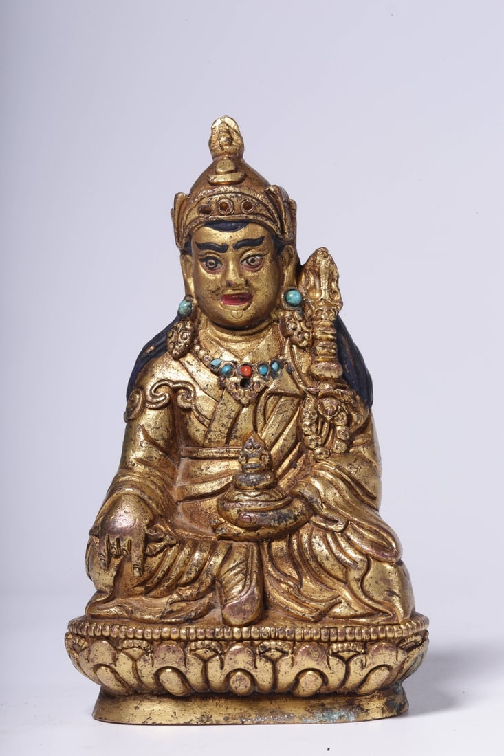 An Exquisite Gilt Bronze Statue of Padma Sambhava: An Exquisite Gilt Bronze Statue of Padma Sambhava Qing Dynasty, China Size:3.6inx2.2inx1.7in Weight:333g铜鎏金莲花生坐像 中国清代