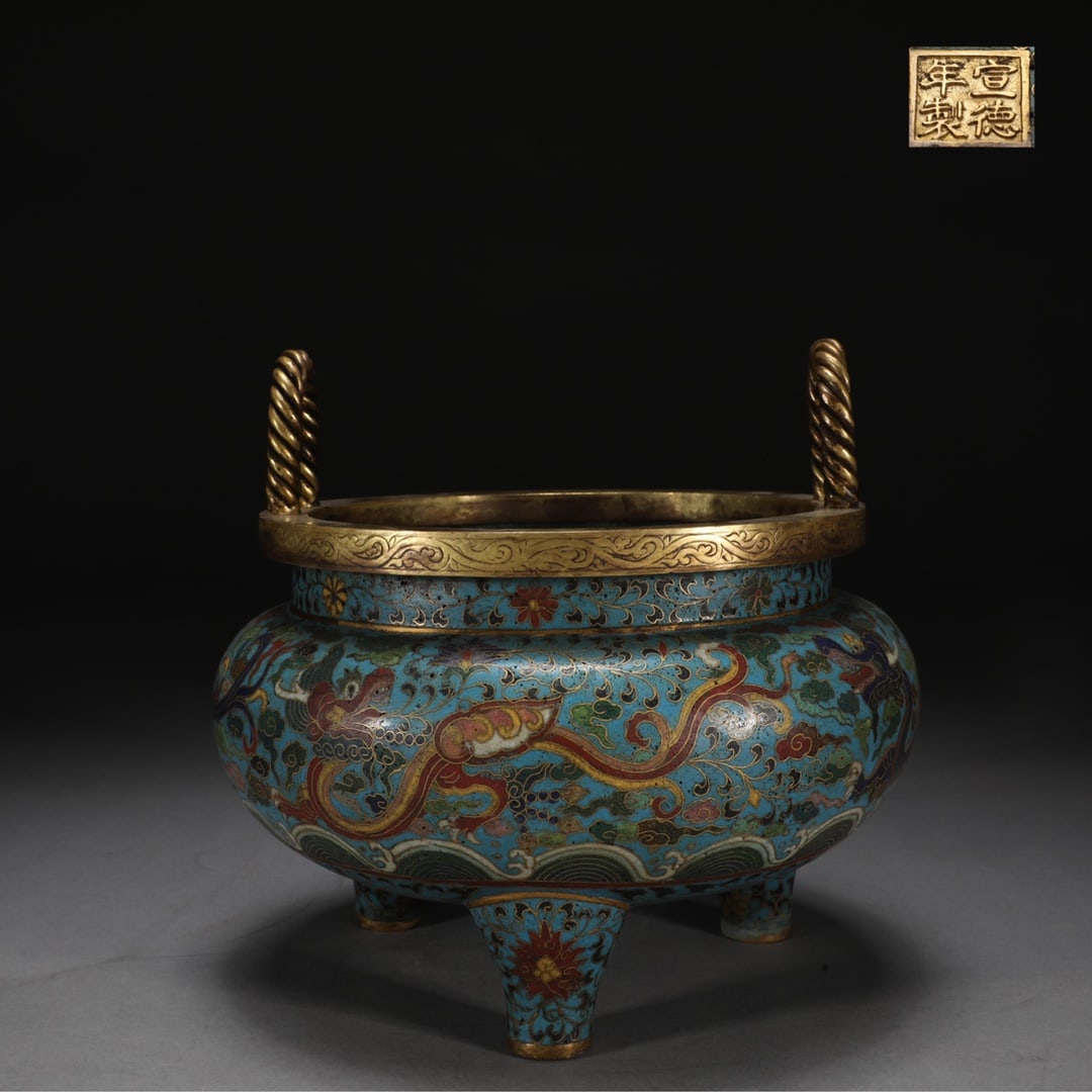 An Exquisite Cloisonne Seawater Pattern Lotus Pattern Dragon Pattern Double-Ears and Tripod Censer: An Exquisite Cloisonne Seawater Pattern Lotus Pattern Dragon Pattern Double-Ears and Tripod Censer Ming Dynasty, China Xuande Four-character Mark Size:7.4inx8.1in Weight:2200g景泰蓝&