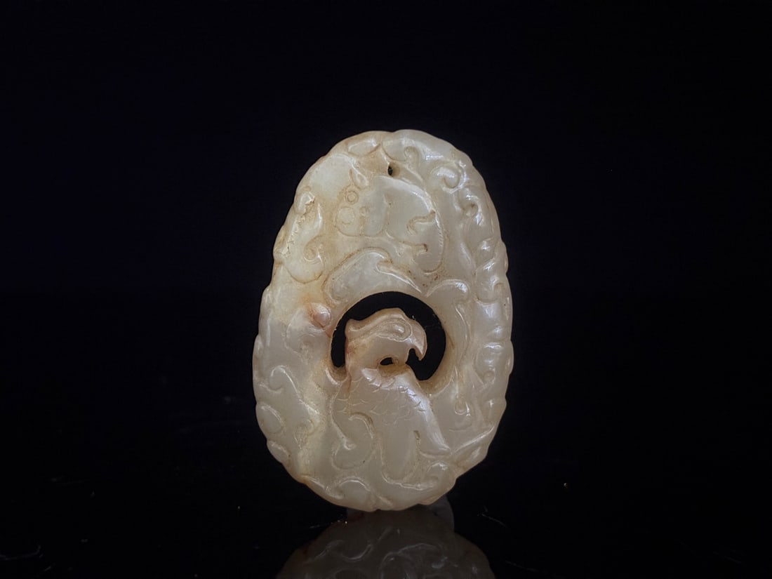 An Exquisite White Jade Auspicious Beast Pattern Pendant (1 of 9)