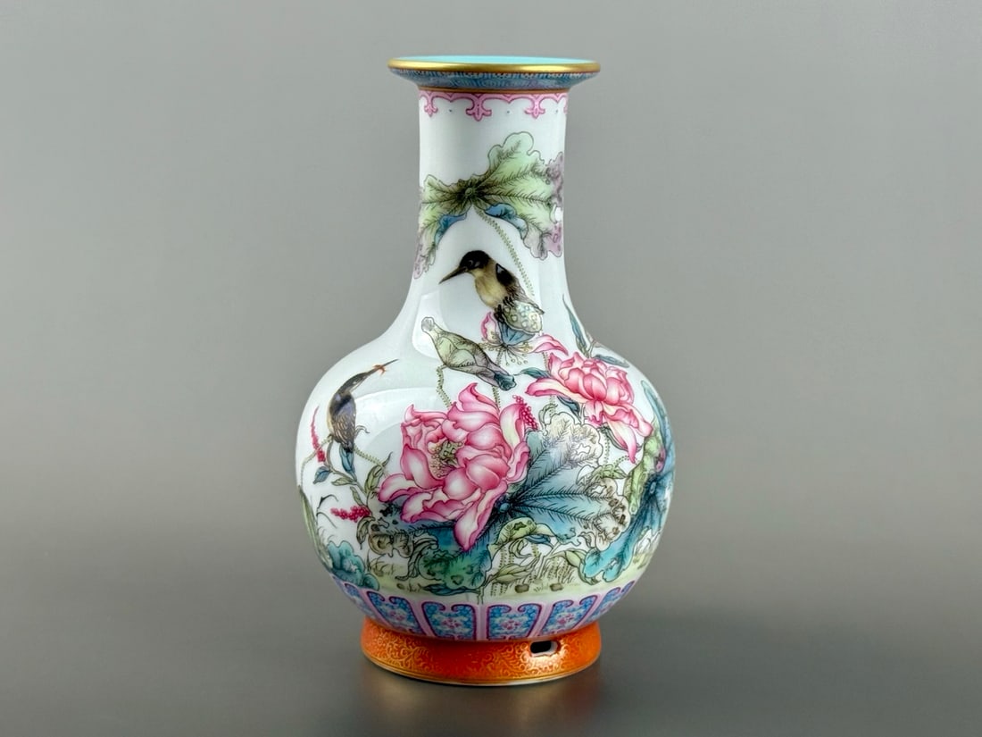 An Exquisite Enamel Iron-Red Painted Gold Flower and Bird Pattern Vase: An Exquisite Enamel Iron-Red Painted Gold Flower and Bird Pattern Vase Qing Dynasty, China Qianlong Four-character Mark Size:5.6inx3.6in矾红描金图案边珐