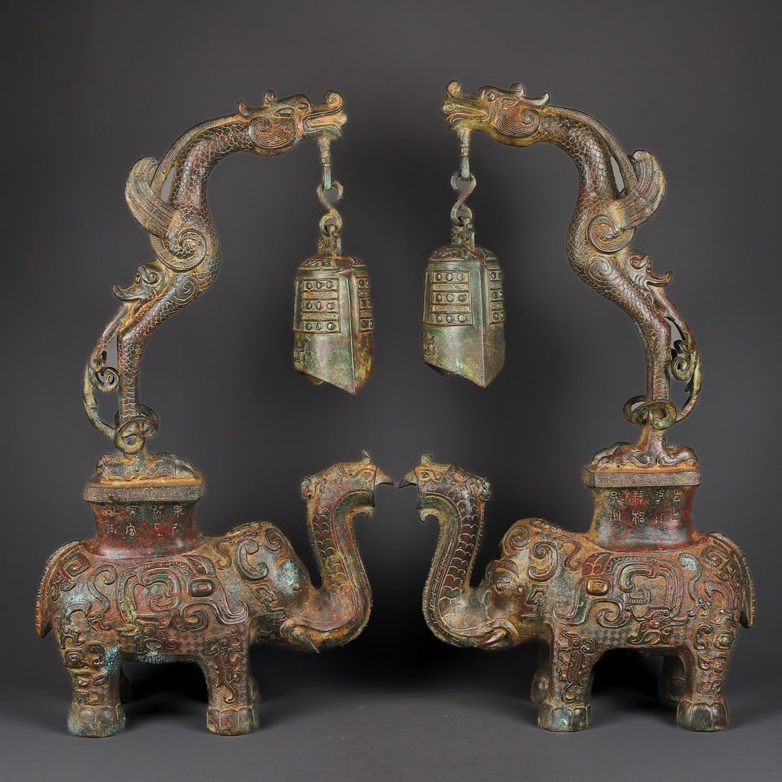 A Pair of Exquisite Bronze With Inscription Elephant Ornament: A Pair of Exquisite Bronze With Inscription Elephant Ornament W.Zhou , China Size:13inx23.2in Weight:13800g青铜龙象钟一对 西周时期
