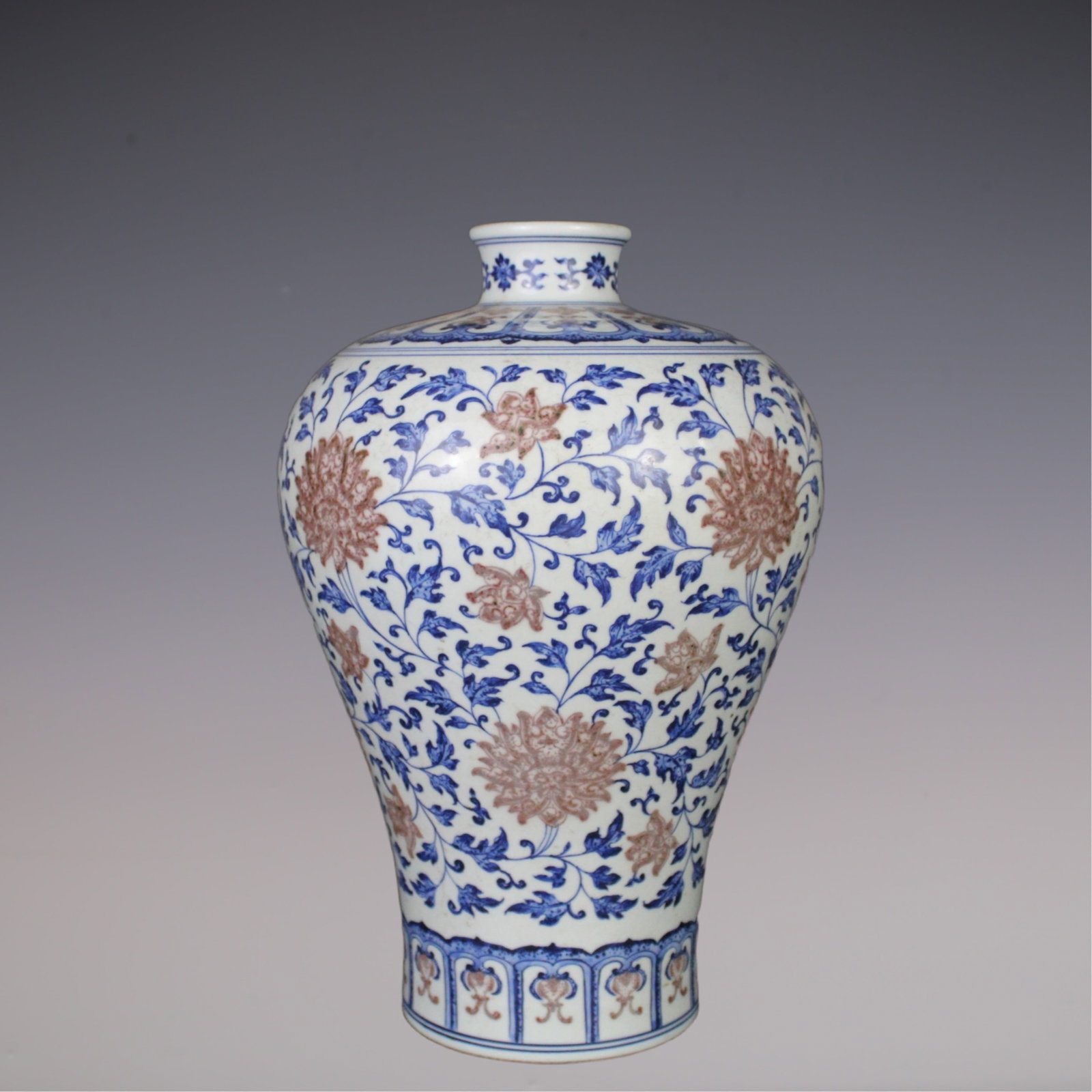 An Exquisite Blue and White Underglaze-Red Lotus Pattern Vase: An Exquisite Blue and White Underglaze-Red Lotus Pattern Vase Qing Dynasty, China Yongzheng Six-character Mark Size:13.6inx5.1in青花釉里红缠莲图案