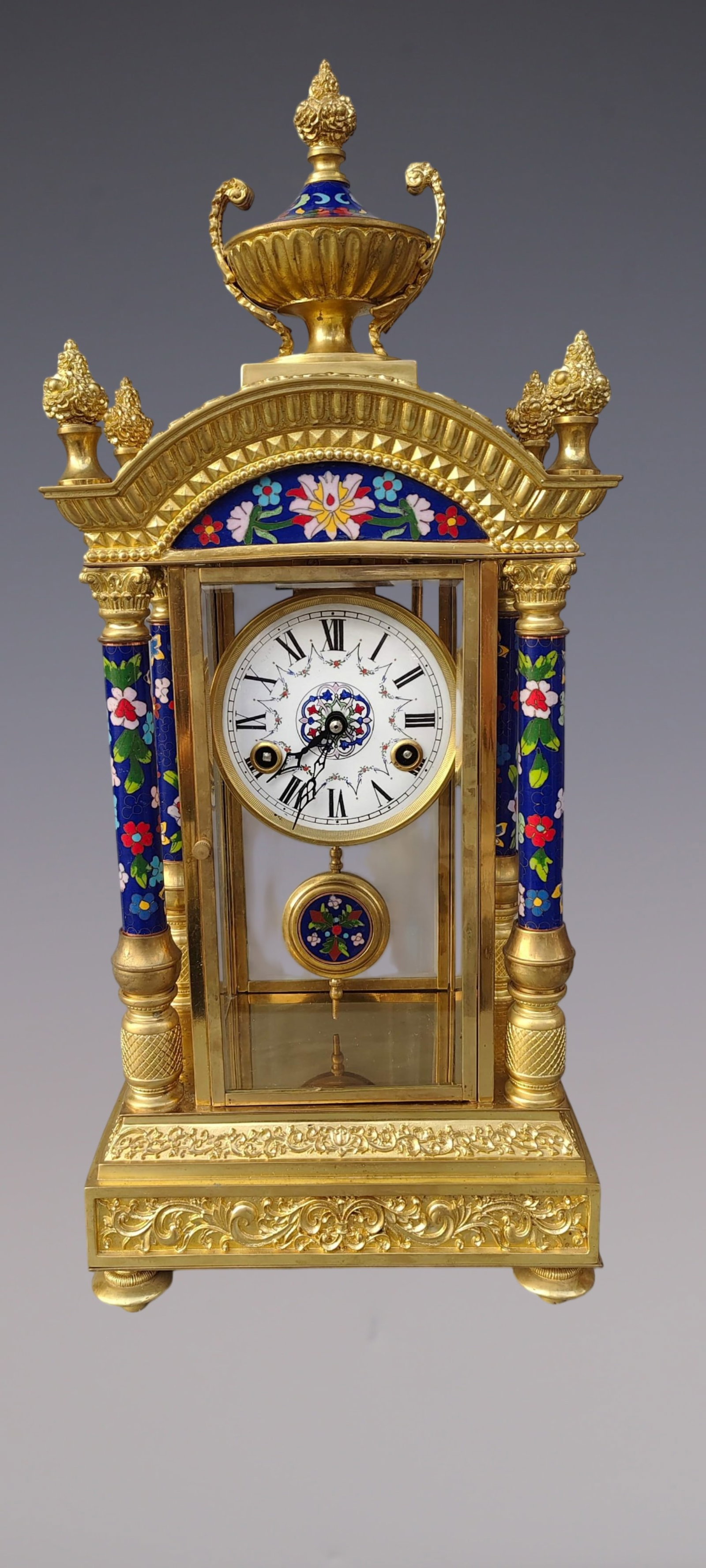An Exquisite Gilt Bronze Lotus Pattern Clock: An Exquisite Gilt Bronze Lotus Pattern Clock Size:22inx9.8inx6.7in铜鎏金缠枝莲纹钟表 Size:56cmx25cmx17cm
