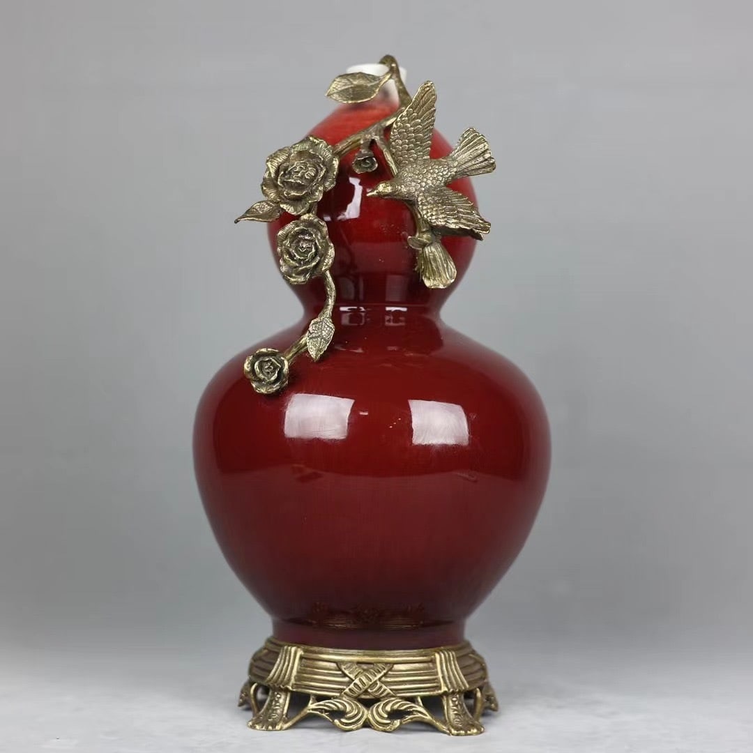 An Exquisite Iron-Red Inlaid Bronze Flower and Bird Pattern Gourd-Shaped Vase: An Exquisite Iron-Red Inlaid Bronze Flower and Bird Pattern Gourd-Shaped Vase Qing Dynasty, China Qianlong Six-character Mark