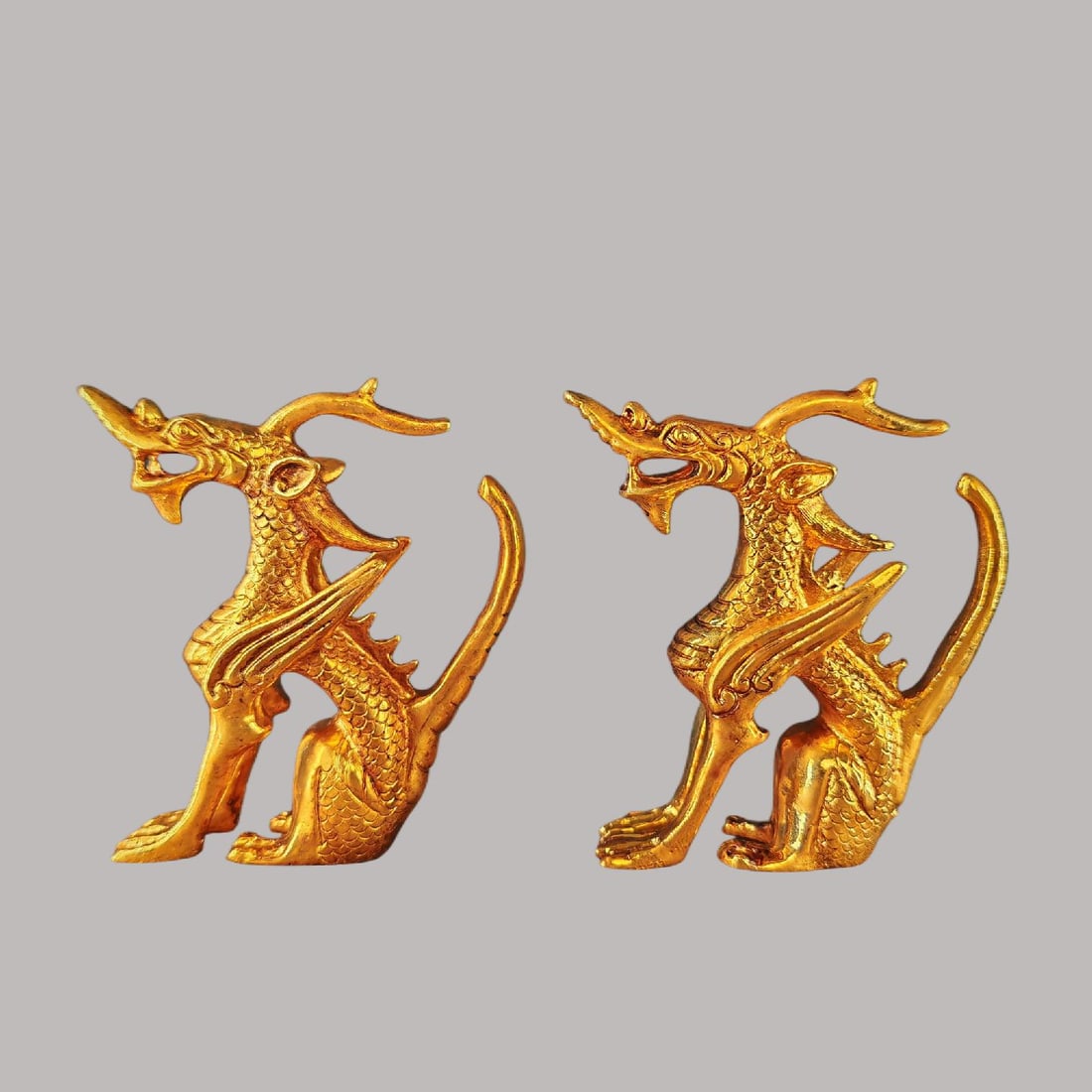 A pair of Exquisite Gilt Bronze Dragon Ornament: A pair of Exquisite Gilt Bronze Dragon Ornament,Qing Dynasty, China,Size:3.1inx3.5in 一对铜鎏金龙摆件,中国清代