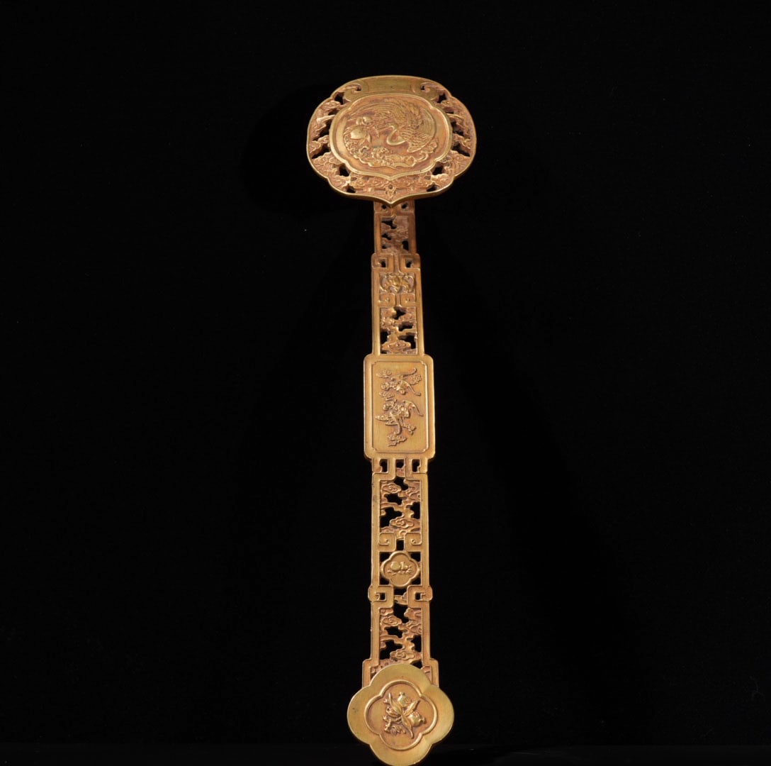A Exquisite Red Copper Gilt Bronze Ruyi Ornament: A Exquisite Red Copper Gilt Bronze Ruyi Ornament,Ming Dynasty, China,Size:14.6in,Weight:715g 紫铜鎏金如意摆件,中国明代