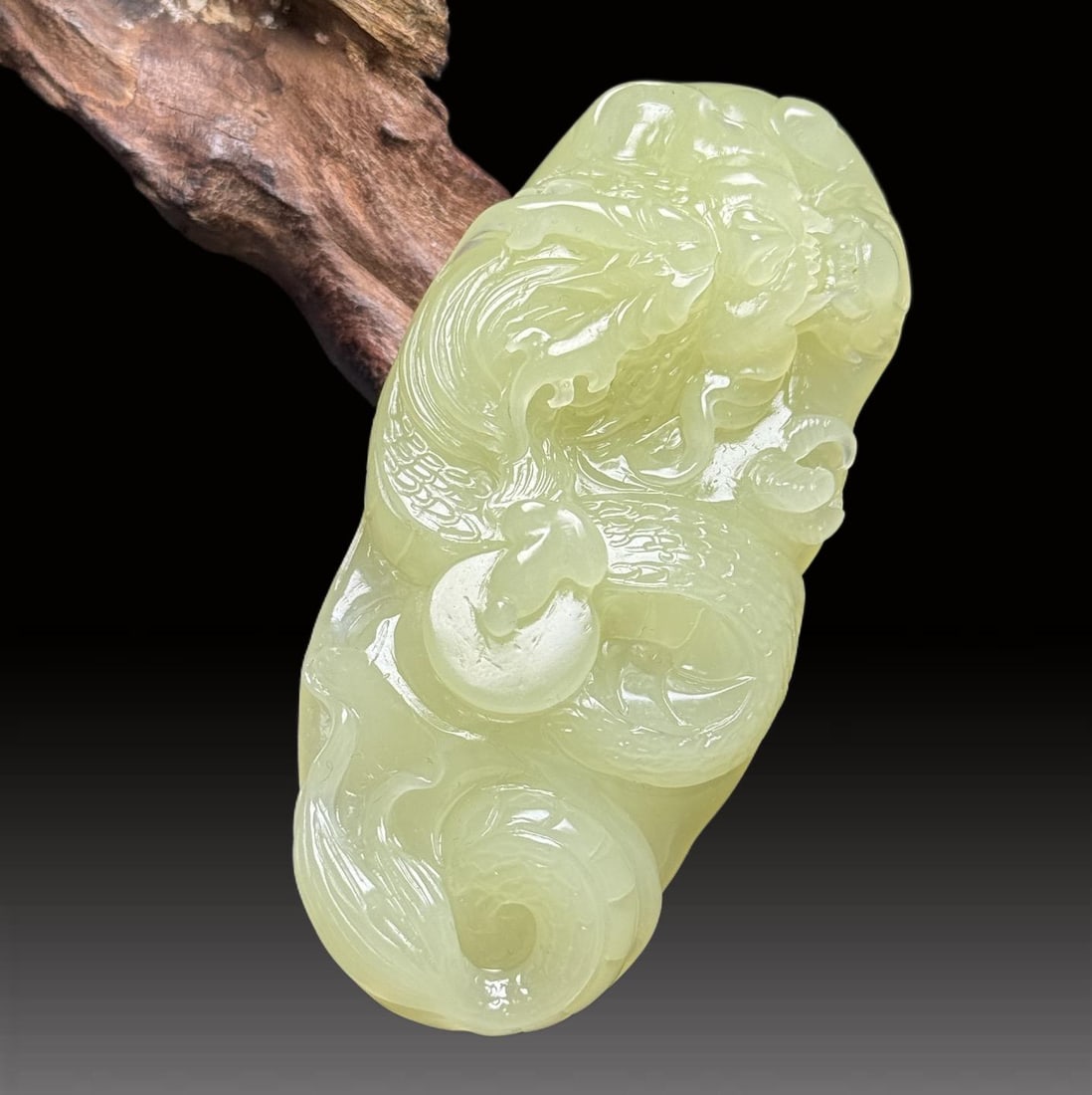 A Exquisite Hotan Yellow Jade Handheld Carving: A Exquisite Hotan Yellow Jade Handheld Carving,Qing Dynasty, China,Size:3.4inx1.6inx0.9in,Weight:92g 和田黄玉手把件,中国清代