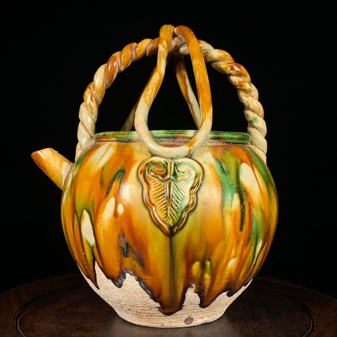 A Exquisite Tang Tri-Color Glazed Pottery Handle Ewer: A Exquisite Tang Tri-Color Glazed Pottery Handle Ewer,Tang Dynasty, China,Size:10inx8.3in 唐三彩提梁壶,中国唐代
