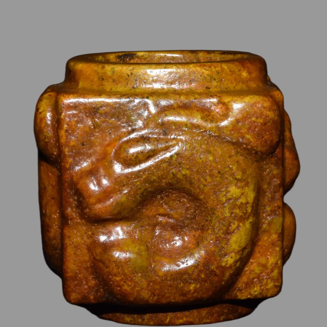 A Exquisite Hemoyu Handheld Carving: A Exquisite Hemoyu Handheld Carving,Ancient Time, China,Size:4.7inx5.1in,Weight:2410g 河磨玉手把件,远古时期