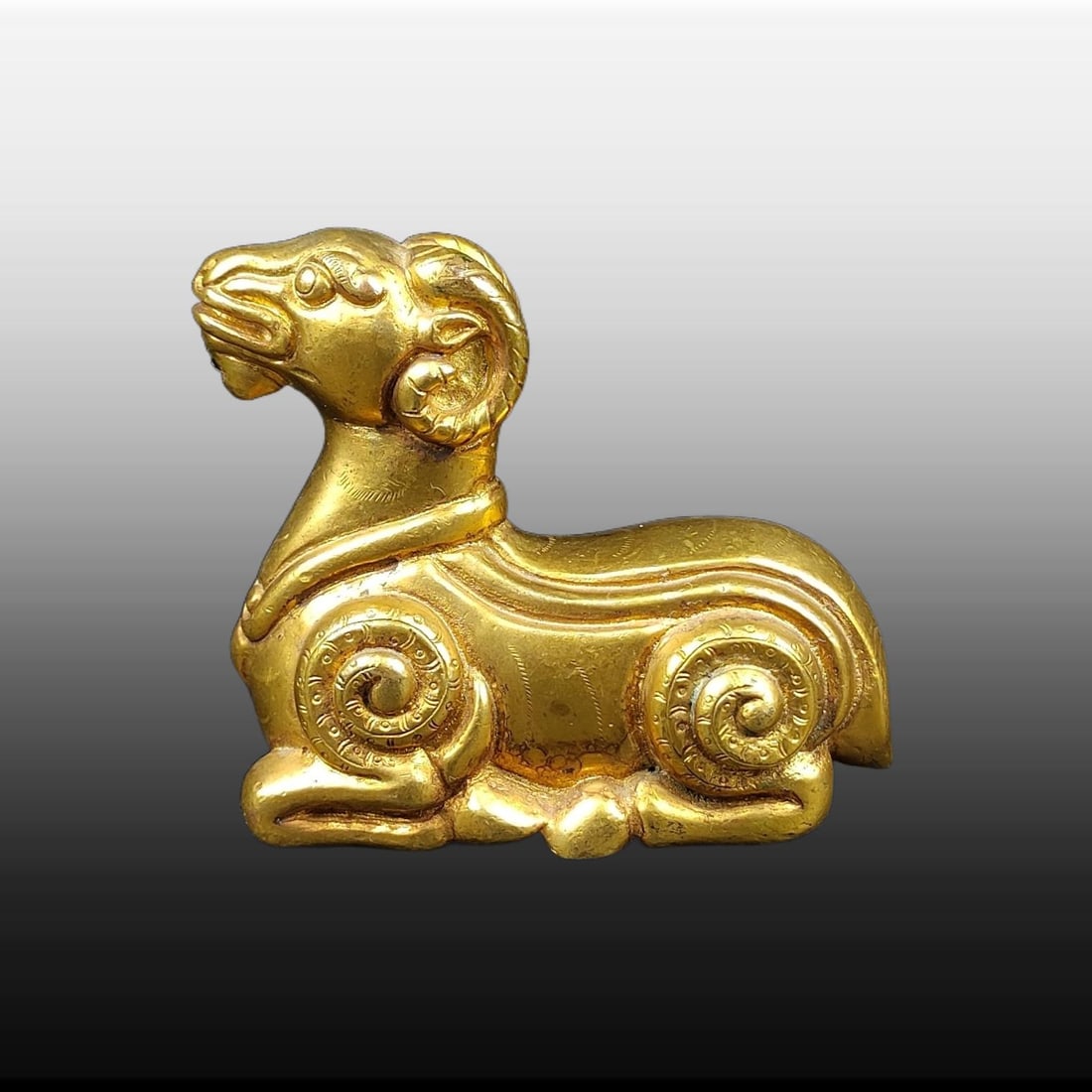 A Exquisite Gilt Bronze Sheep Ornament: A Exquisite Gilt Bronze Sheep Ornament,Han Dynasty, China,Size:2inx2.4in,Weight:226g 铜鎏金羊摆件,中国汉代