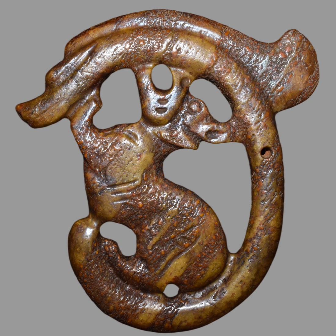 A Exquisite Hemoyu Dragon: A Exquisite Hemoyu Dragon,Ancient Time, China,Size:9.4inx9.8in,Weight:1740g 河磨玉龙,远古时期