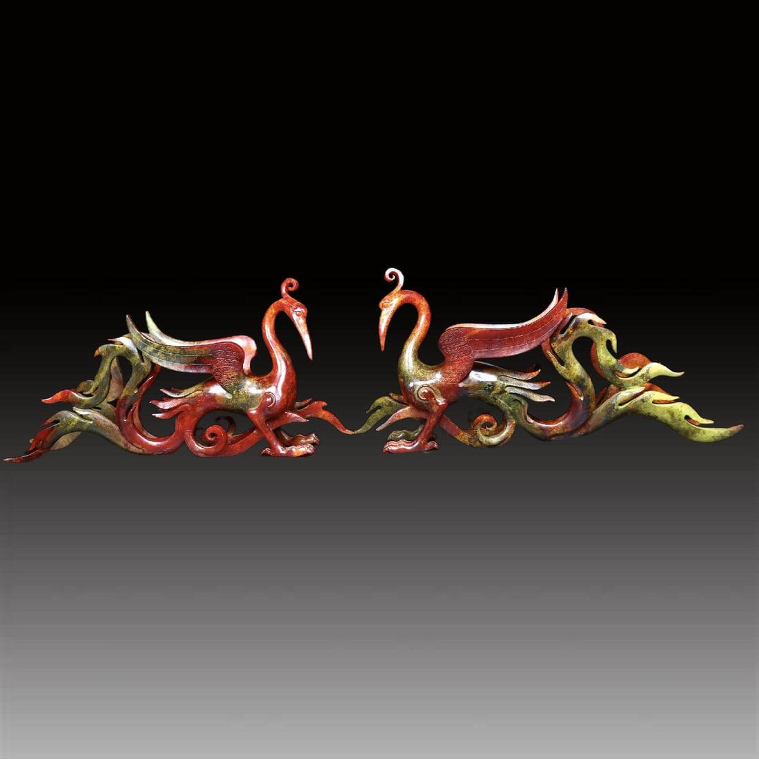 A pair of Exquisite Hotan Jade Phoenix Ornament: A pair of Exquisite Hotan Jade Phoenix Ornament,Han Dynasty, China,Size:9.6inx1.9inx3.9in,Weight:365g 一对和田玉凤摆件,中国汉代