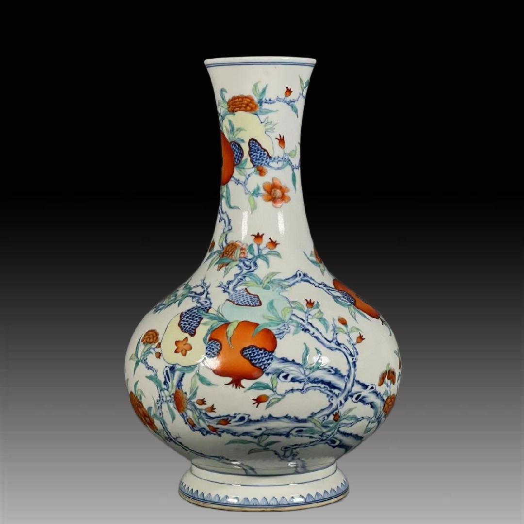 A Exquisite Blue and White Flower and Fruit Pattern Vase: A Exquisite Blue and White Flower and Fruit Pattern Vase,Qing Dynasty, China,Qianlong Six-character Mark,Size:12.7inx3.2inx5in 青花花果纹瓶,中国清
