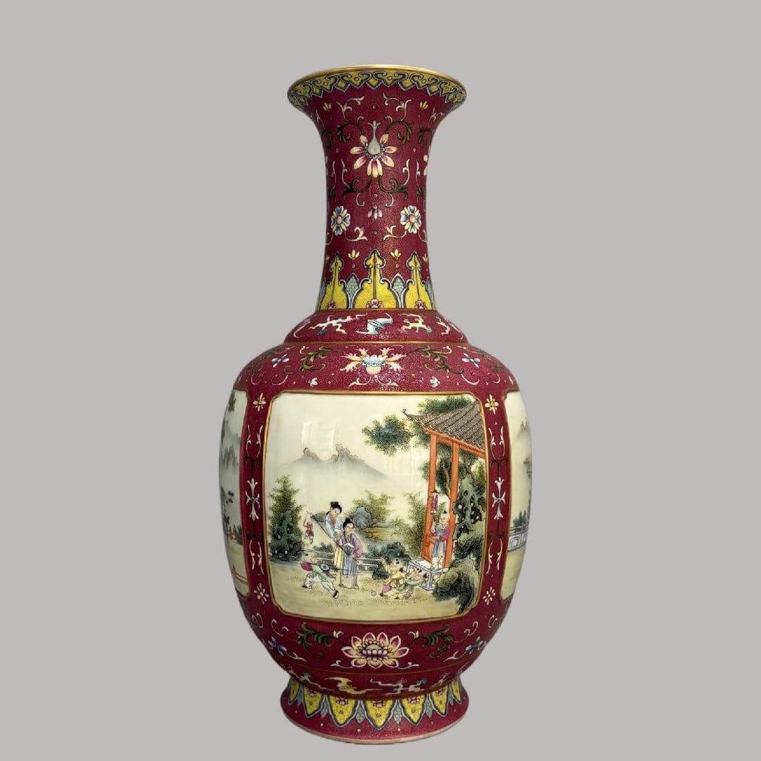A Exquisite Ruby Red-Ground Figures Pattern Vase: A Exquisite Ruby Red-Ground Figures Pattern Vase,Qing Dynasty, China,Qianlong Six-character Mark,Size:16.9inx8.7in 胭脂红地人物纹瓶,中国