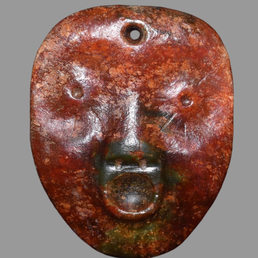 A Exquisite Hemoyu Facial Mask: A Exquisite Hemoyu Facial Mask,Ancient Time, China,Size:3.7inx4.7in,Weight:360g 河磨玉脸谱,远古时期