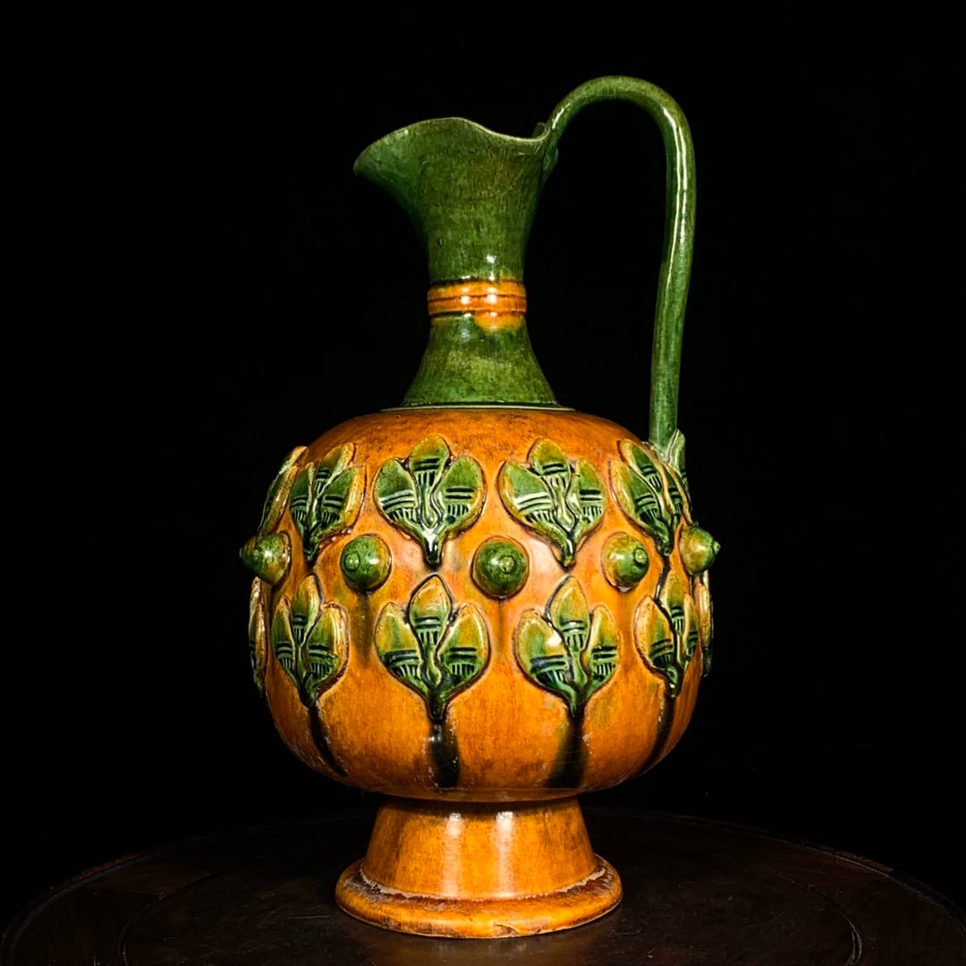 A Exquisite Tang Tri-Color Glazed Pottery Flower Pattern Ewer: A Exquisite Tang Tri-Color Glazed Pottery Flower Pattern Ewer,Tang Dynasty, China,Size:12inx6.7in 唐三彩花卉纹壶,中国唐代