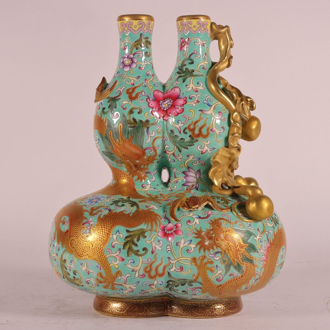 A Exquisite Enamel Green Ground Lotus Pattern Dragon Pattern Gourd Vase: A Exquisite Enamel Green Ground Lotus Pattern Dragon Pattern Gourd Vase,Qing Dynasty, China,Qianlong Six-character Mark,Size:7.7inx5.9in