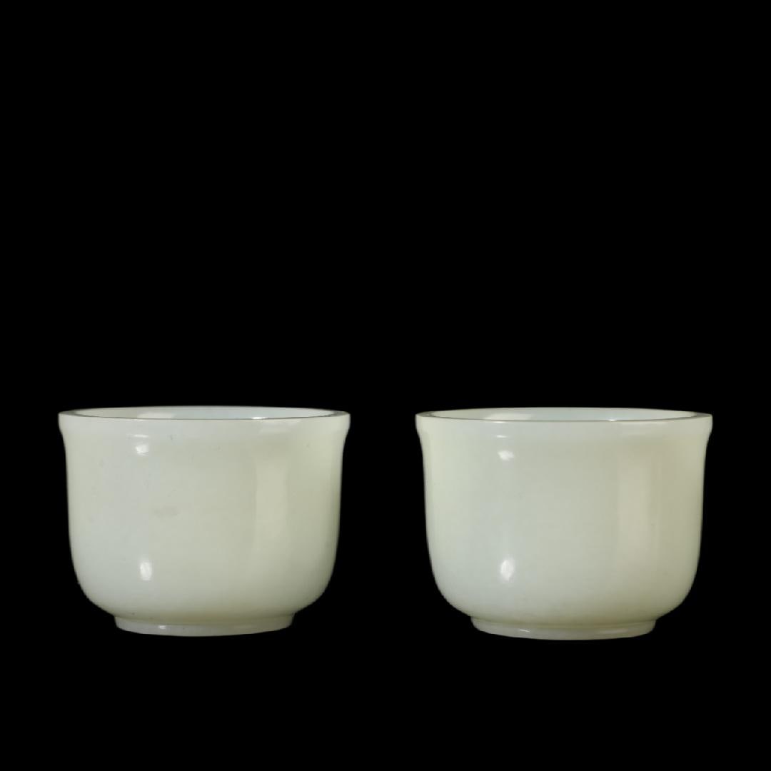 A pair of Exquisite Hotan Jade Cup: A pair of Exquisite Hotan Jade Cup,Qing Dynasty, China,Size:1.6inx2.2in,Weight:80g 一对和田玉杯,中国清代