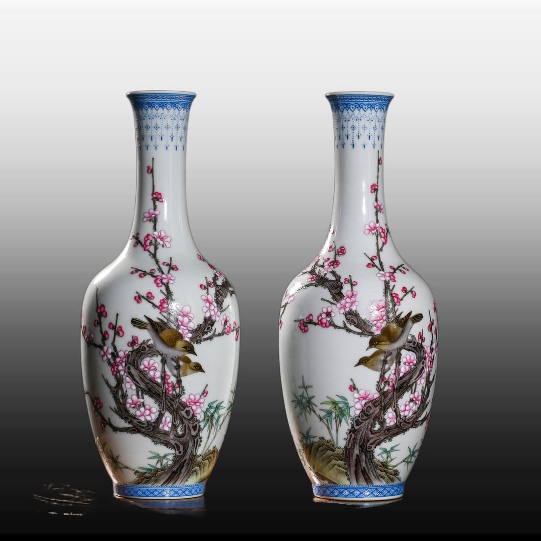 A pair of Exquisite Famille-Rose Flower and Bird Pattern Vase: A pair of Exquisite Famille-Rose Flower and Bird Pattern Vase,Qing Dynasty, China,Qianlong Six-character Mark,Size:9.4inx4.3inx2.1in