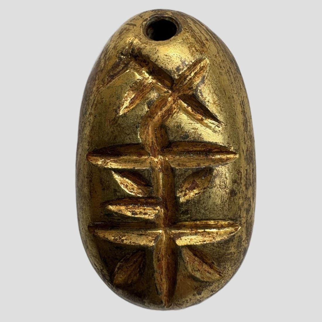A Exquisite Gilt Bronze Coin: A Exquisite Gilt Bronze Coin,Han Dynasty, China,Size:0.7inx1.3in,Weight:26.3g 铜鎏金鬼脸金钱,中国汉代