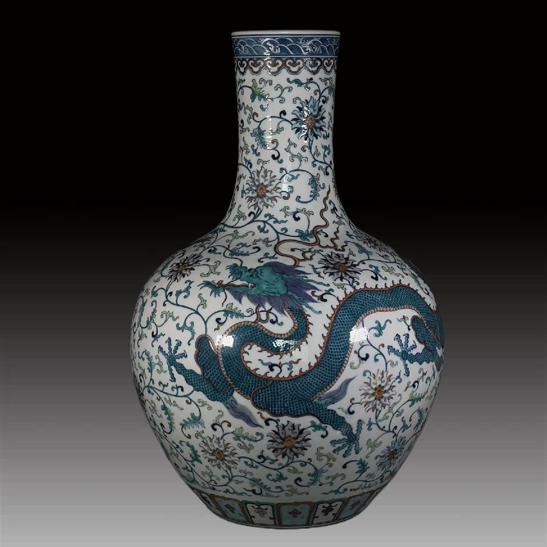 A Exquisite Wucai Dragon Pattern Vase: A Exquisite Wucai Dragon Pattern Vase,Qing Dynasty, China,Qianlong Six-character Mark,Size:28.9inx6.3inx10in