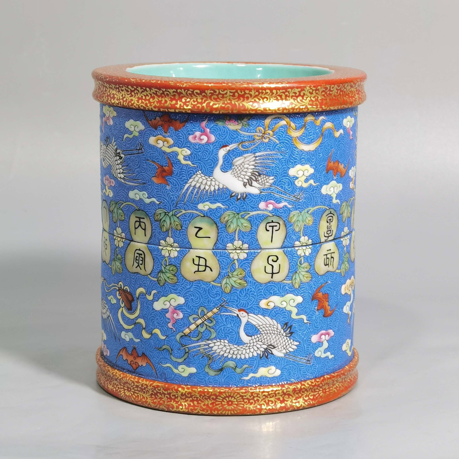 An Exquisite Blue Ground Enamel Auspicious Cloud and Crane Pattern Brush Pot: An Exquisite Blue Ground Enamel Auspicious Cloud and Crane Pattern Brush Pot,Qing Dynasty,China,Qianlong Six-character Mark,Size:4.1inx4.6in