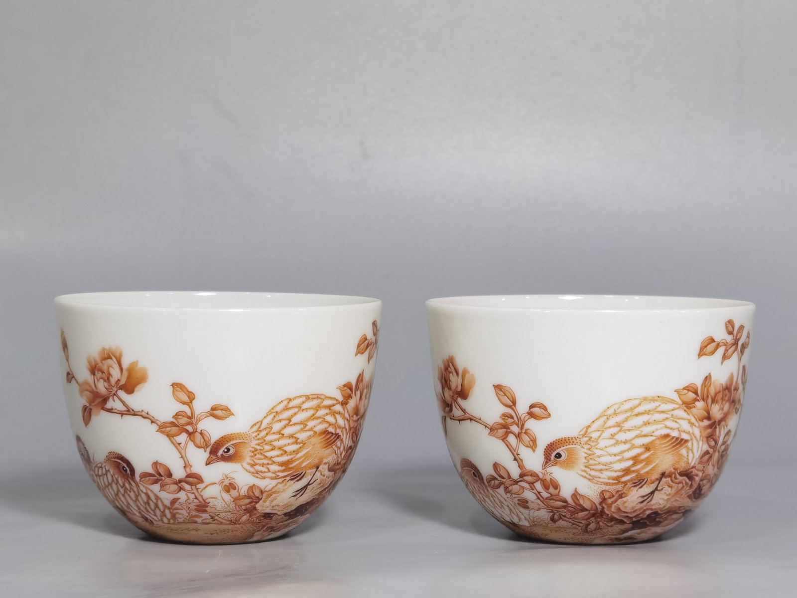 A Pair of Exquisite Ink Color Flower and Bird Pattern Cups: A Pair of Exquisite Ink Color Flower and Bird Pattern Cups,Qing Dynasty,China,Yongzheng Six-character Mark,Size:2.6inx1.9in 一对墨彩花鸟纹杯子,