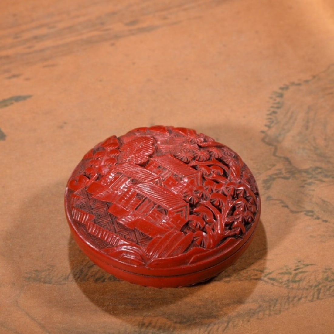 An Exquisite Carved Red Lacquer Landscape Pattern Box: An Exquisite Carved Red Lacquer Landscape Pattern Box,Qing Dynasty,China,Size:1inx2.6in,Weight:54g 剔红漆山水纹盒,中国清代